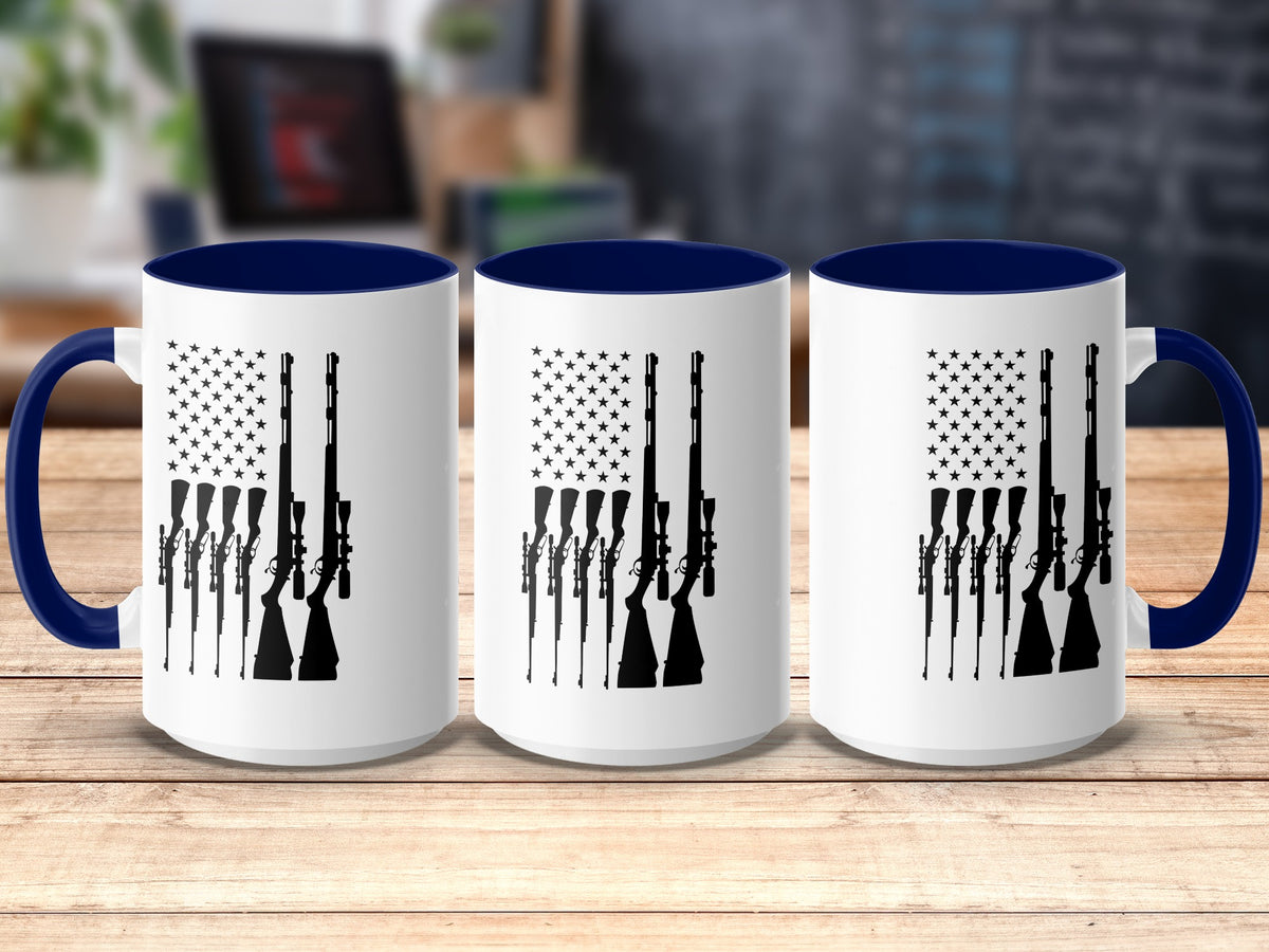 Three white mugs with navy handles and rims, featuring a rifle silhouette American flag design.