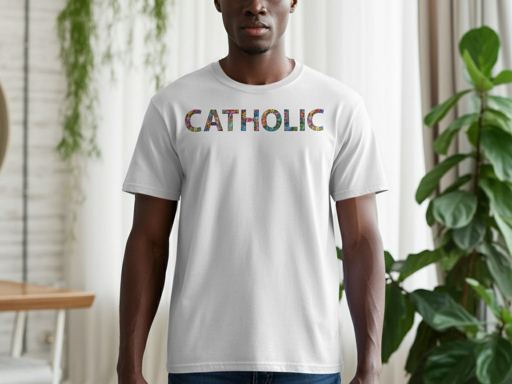 White t-shirt with "CATHOLIC" text in a colorful, patterned font.