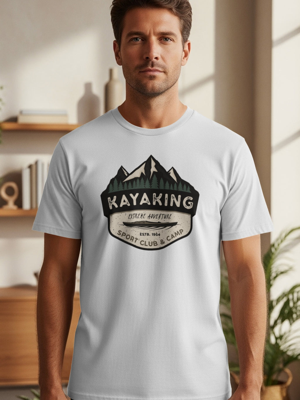 White t-shirt with a "Kayaking Extreme Adventure Sport Club & Camp ESTB. 1954" emblem.