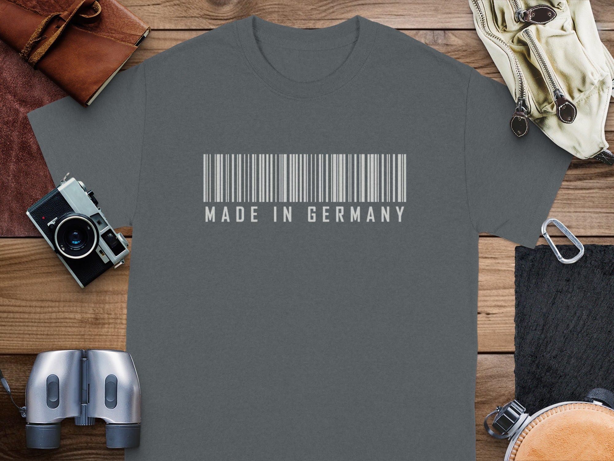 Gray t-shirt with white barcode and "MADE IN GERMANY" text.