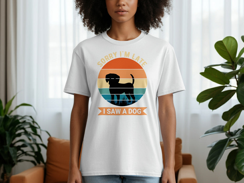 White t-shirt with graphic text "SORRY I'M LATE I SAW A DOG" and dog silhouette.