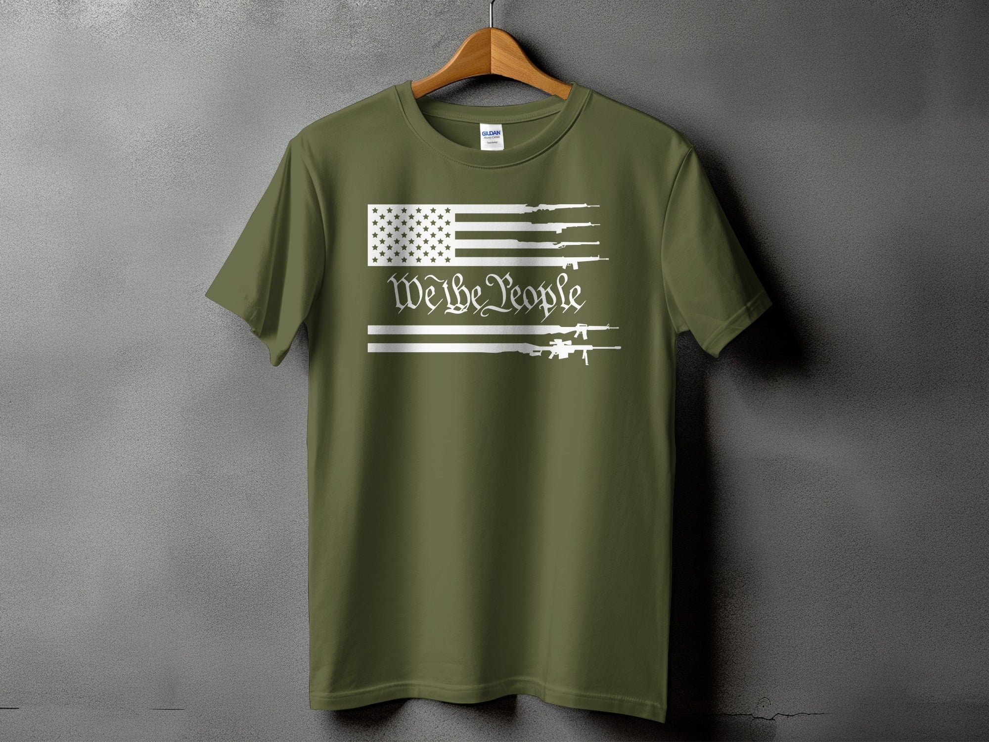 Olive green t-shirt with American flag graphic and "We the People" text.