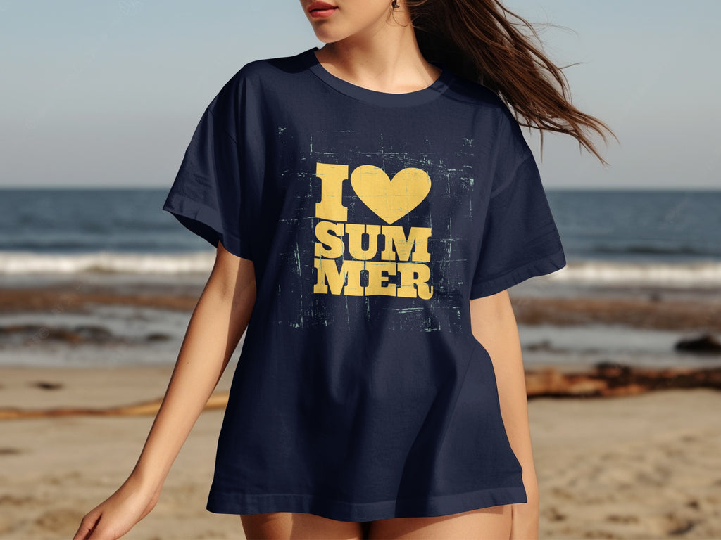 Navy t-shirt with yellow "I heart SUMMER" graphic on a beach background.