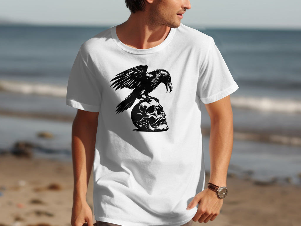 White t-shirt with black graphic of a raven perched on a skull.