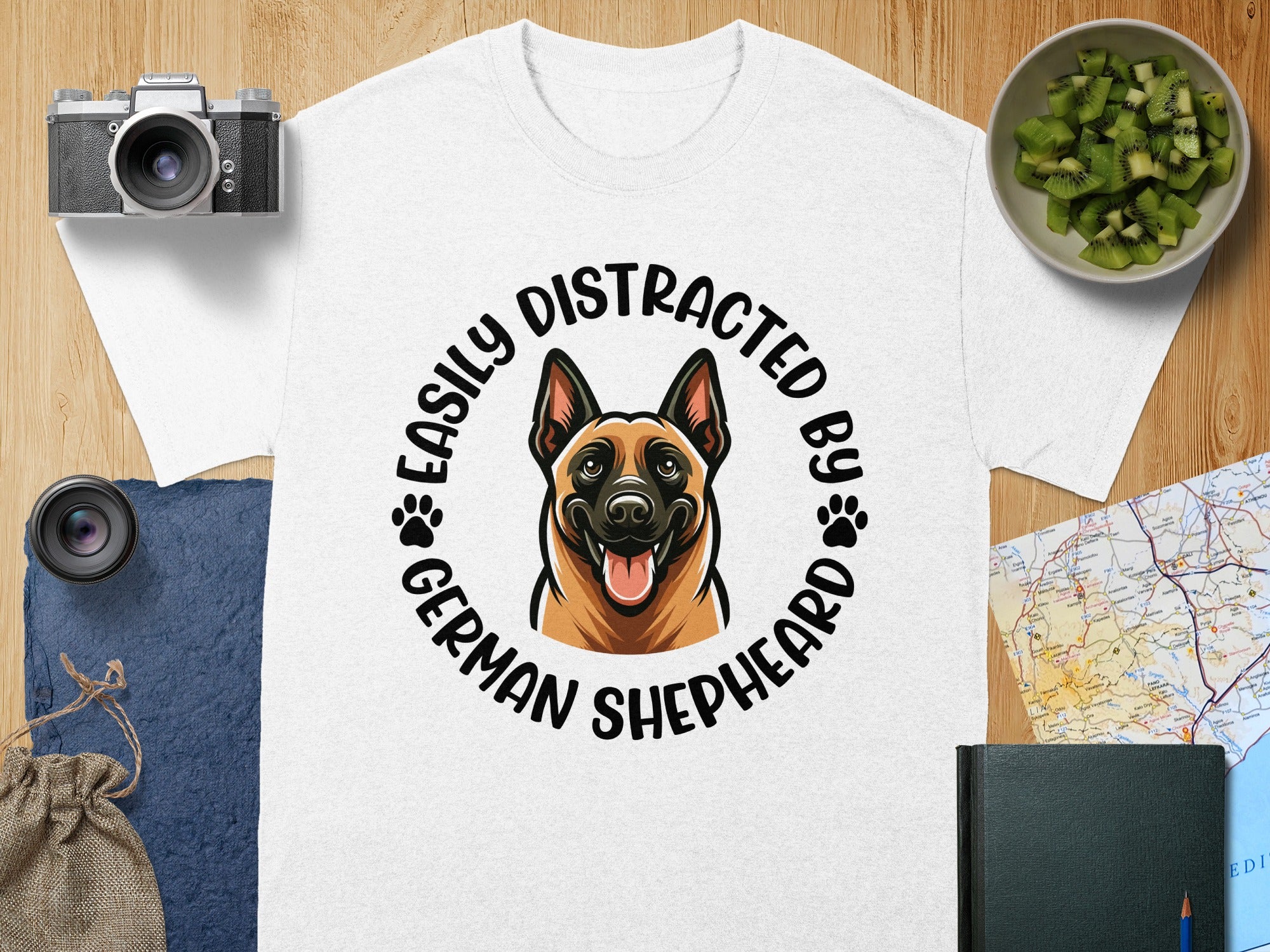 German Shepherd head graphic with paw prints and text "Easily Distracted by German Shepherd".