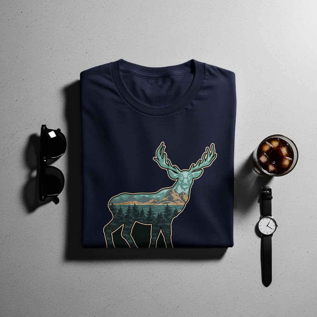 Navy t-shirt with a deer silhouette filled with a mountain landscape.