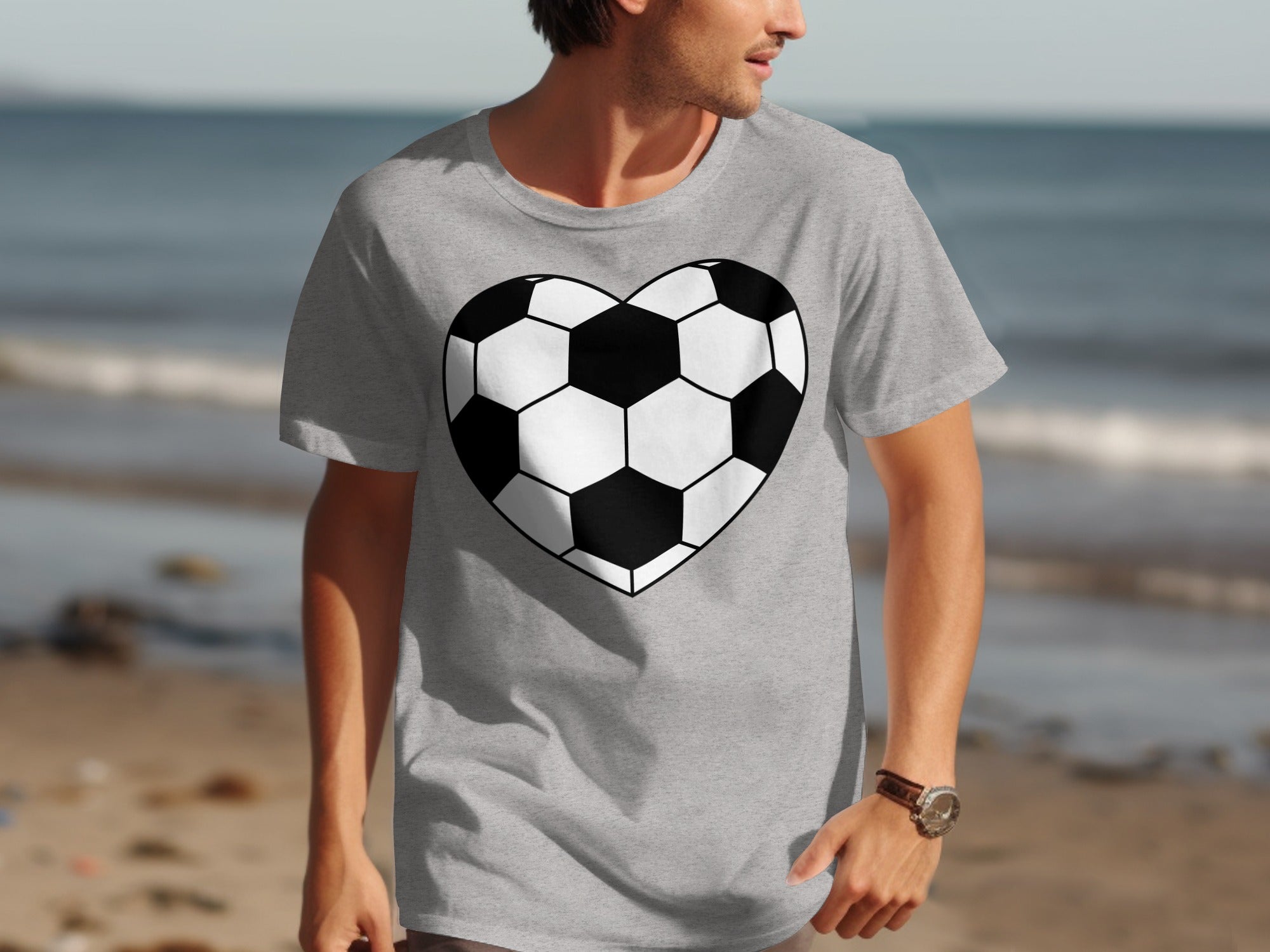 Grey t-shirt with a heart-shaped soccer ball graphic on the front.