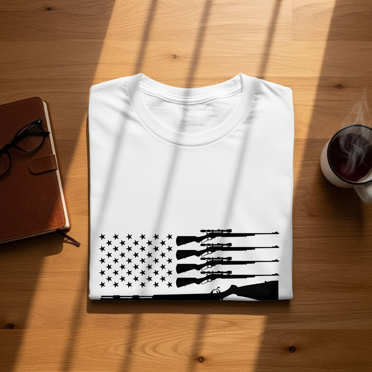 White t-shirt with black rifle silhouettes on an American flag design.