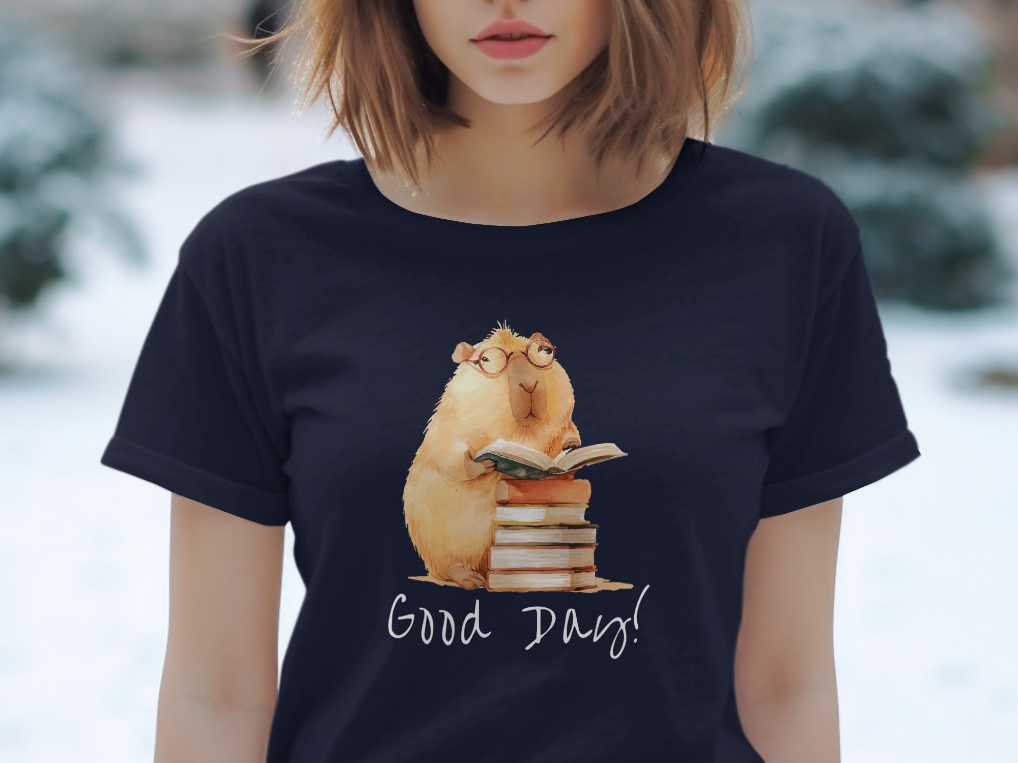 Illustration of a capybara reading on a stack of books with "Good Day!" text.