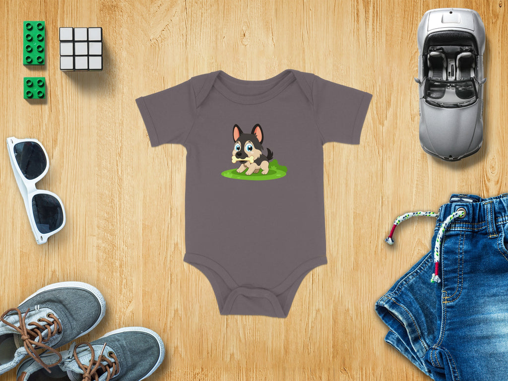 Gray baby onesie with a cartoon German Shepherd puppy holding a bone.