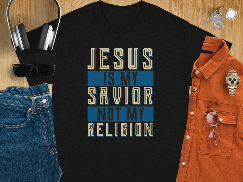 Black t-shirt with text "JESUS IS MY SAVIOR NOT MY RELIGION"