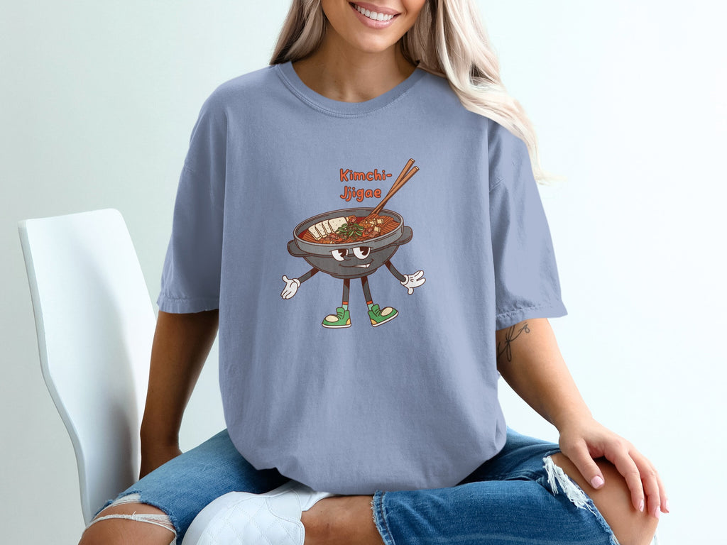 T-shirt graphic: cartoon bowl of kimchi jjigae with chopsticks and legs.