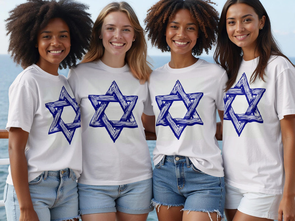 Four smiling women in white t-shirts with a blue Star of David graphic.