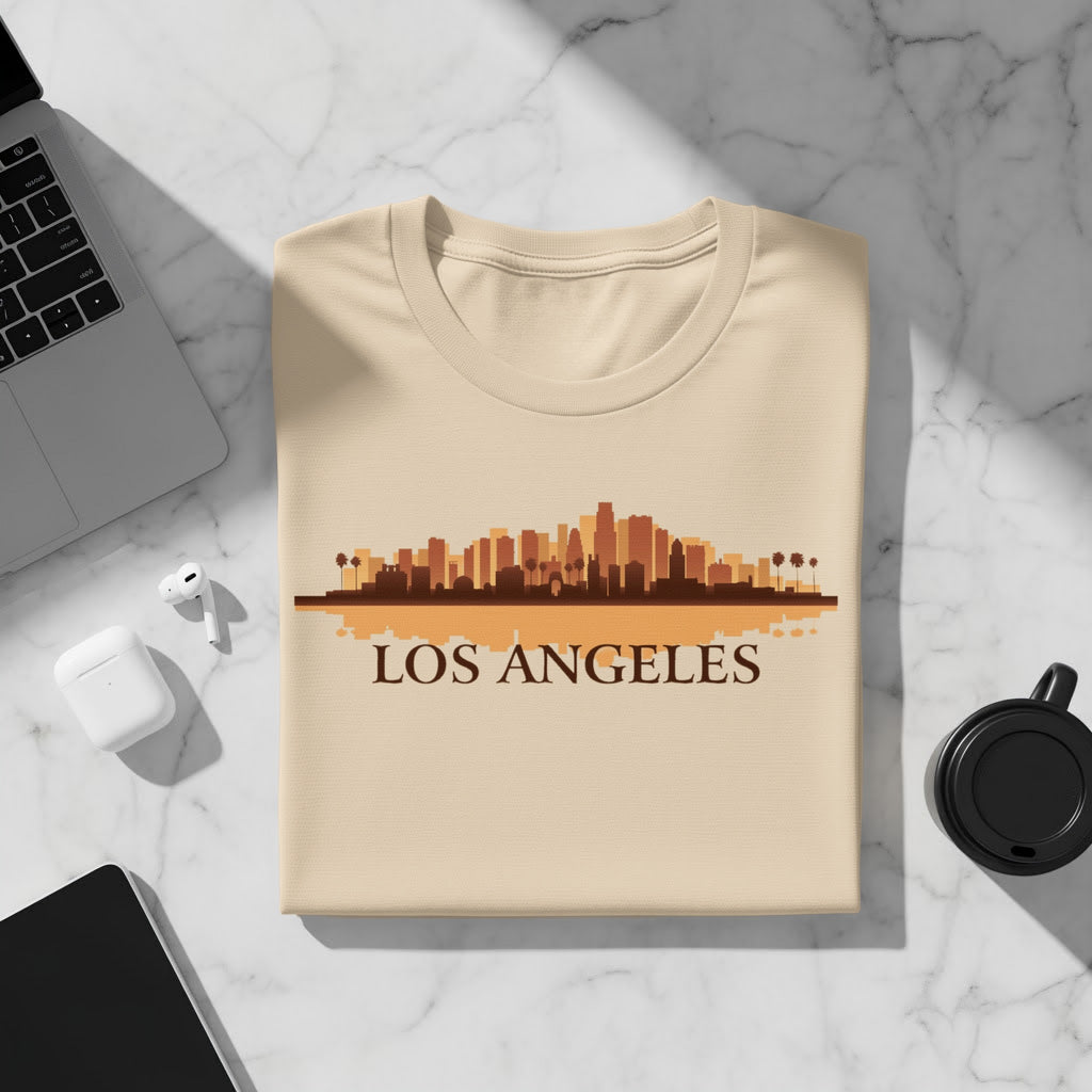 Light tan t-shirt with a brown Los Angeles skyline graphic and text.