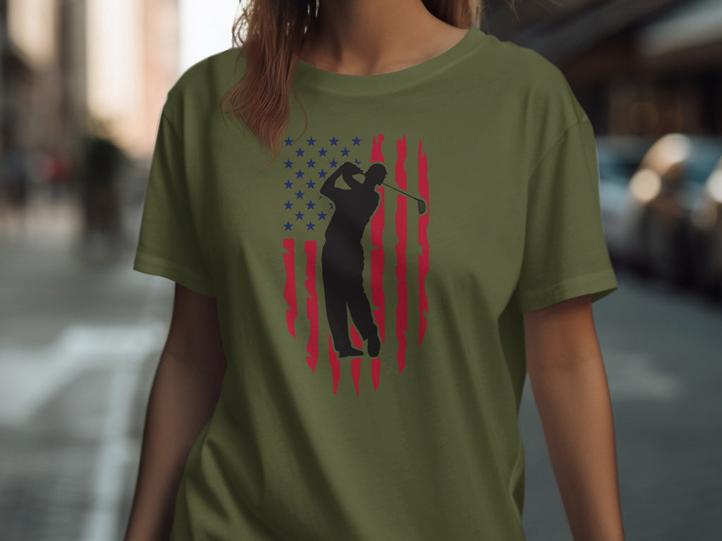 Olive t-shirt with black golfer silhouette in front of distressed American flag design.