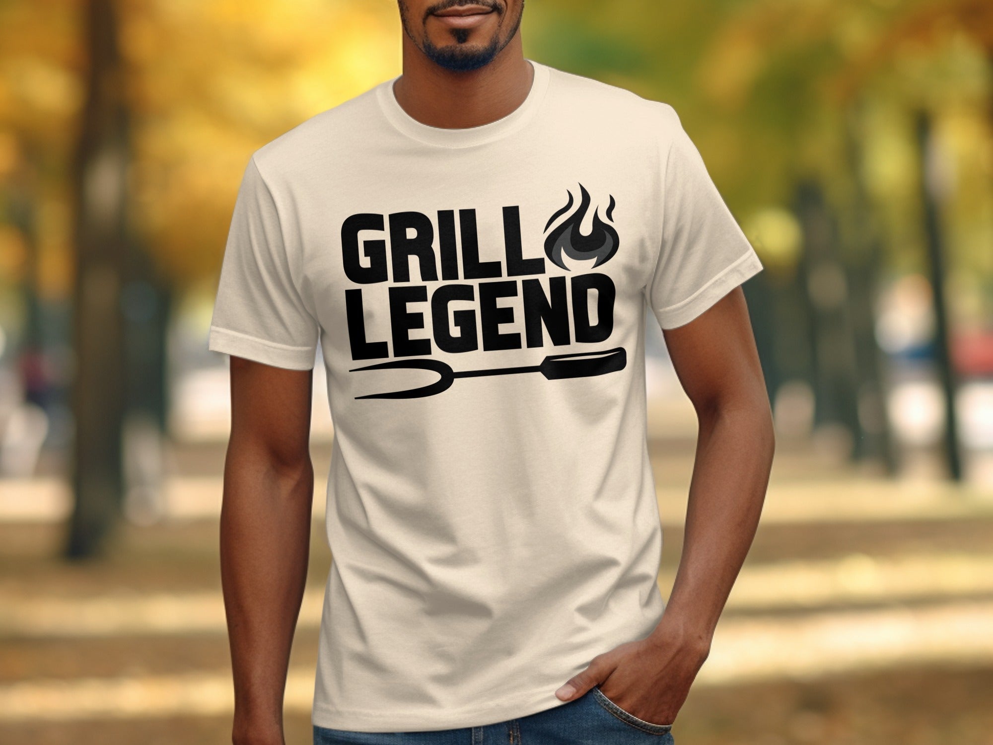 Cream t-shirt with black text and grilling graphic: "Grill Legend"