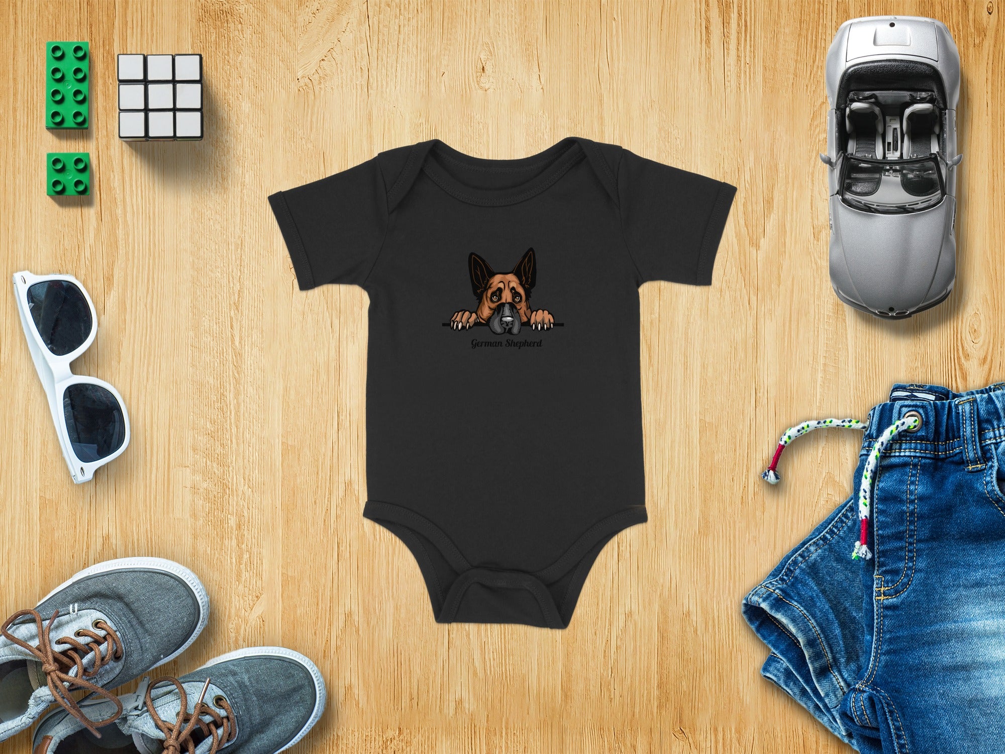 Black baby onesie with German Shepherd graphic and text.