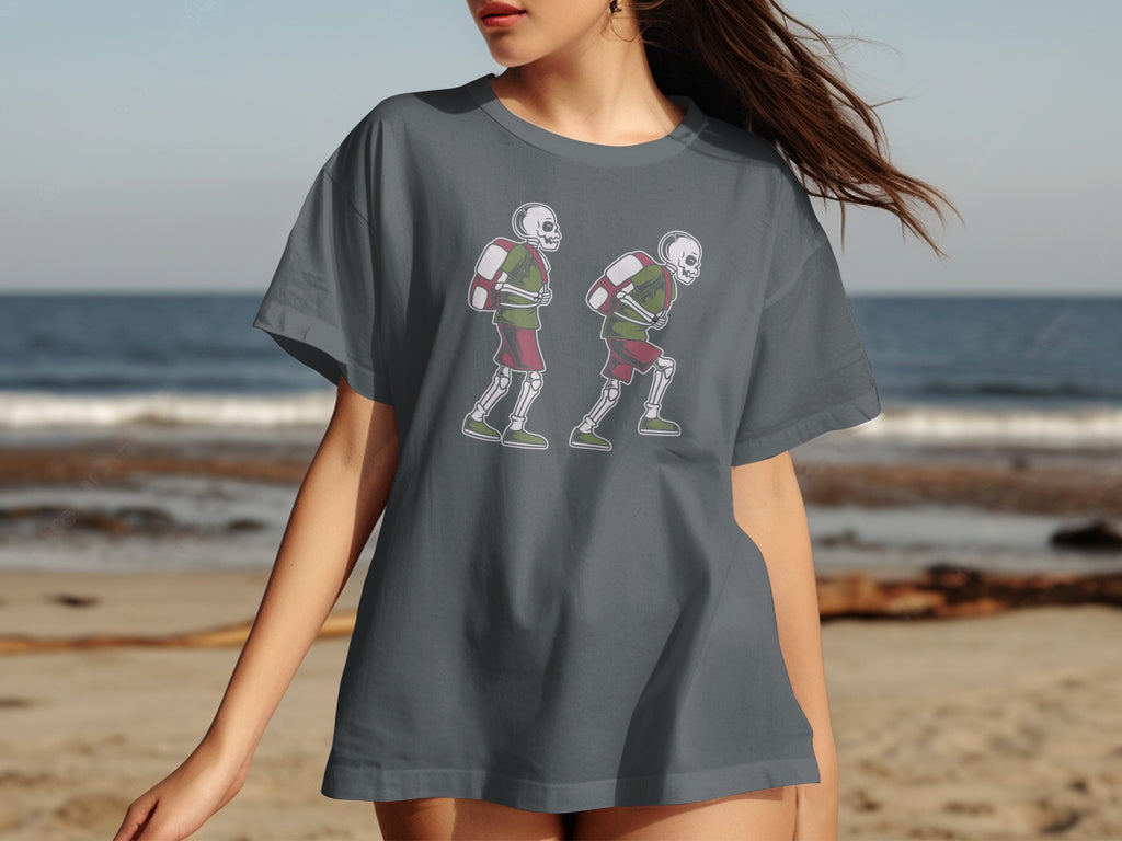 Two skeletons running in athletic gear on a dark grey t-shirt.